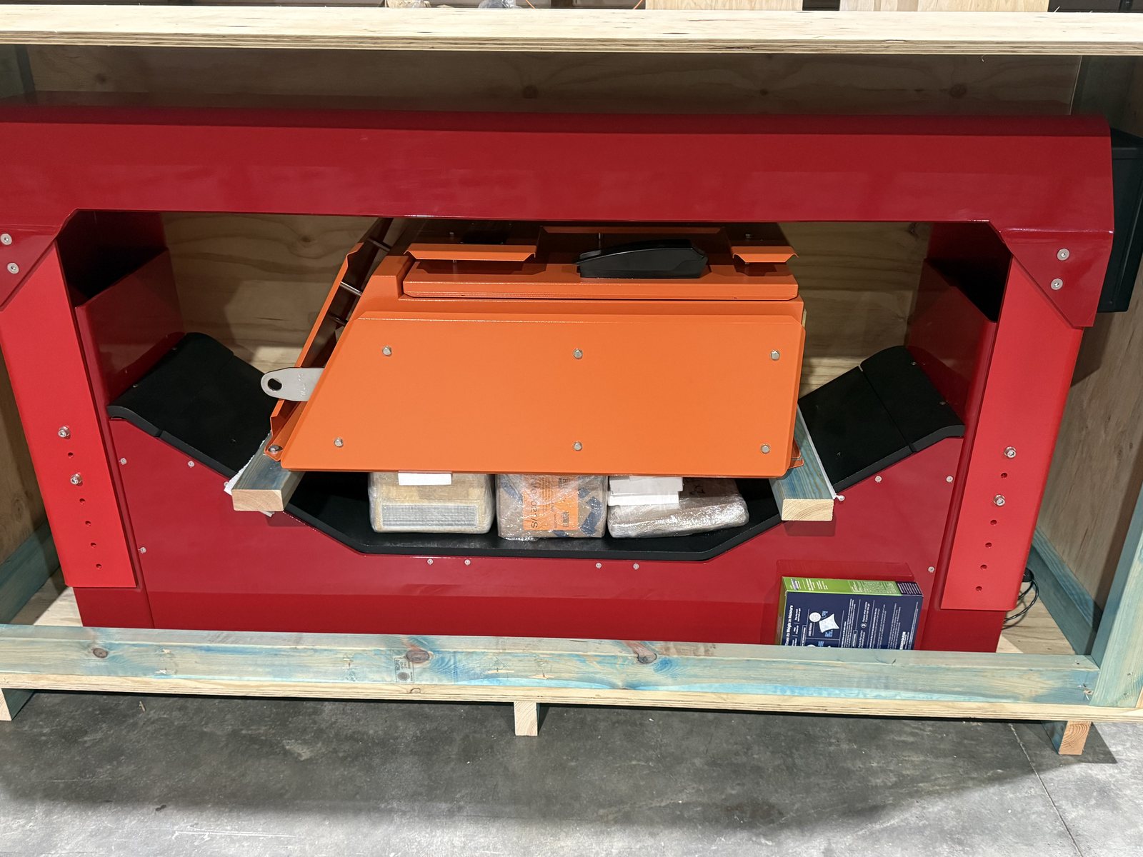 Complete system crated for freight: frame assembled, coils fitted, controller packed inside