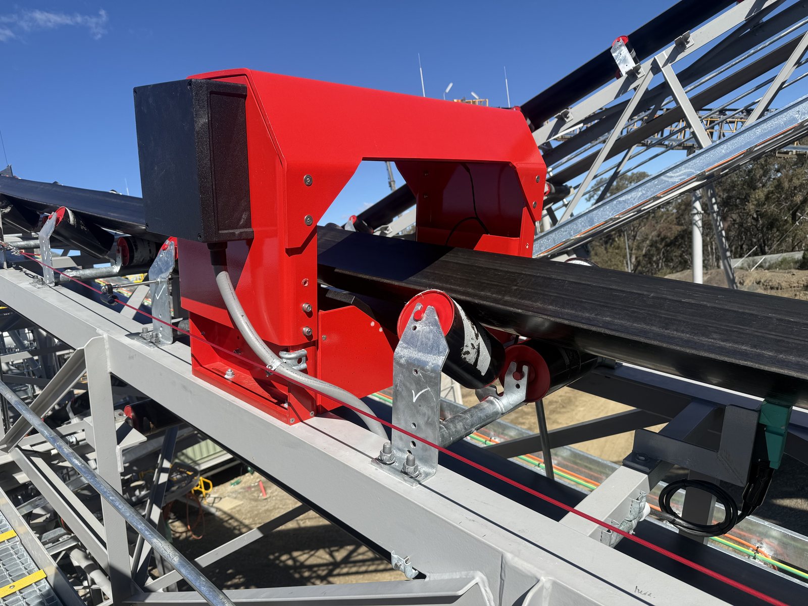TripTronic 3000 tramp metal detector installed on a conveyor